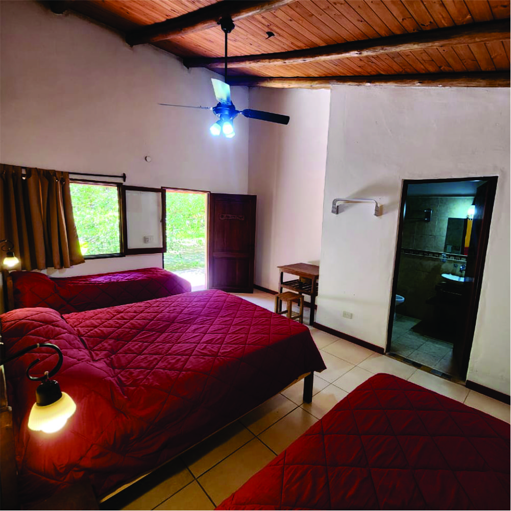 Habitación de Huella Iberá con vista al jardín